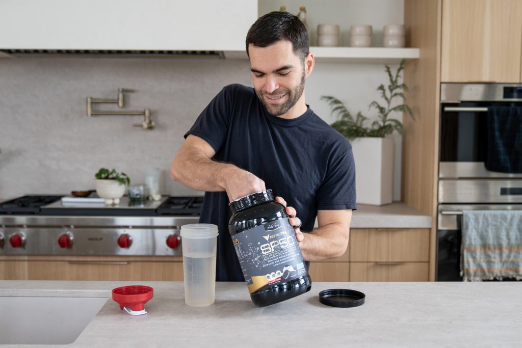 Man Scooping Protein